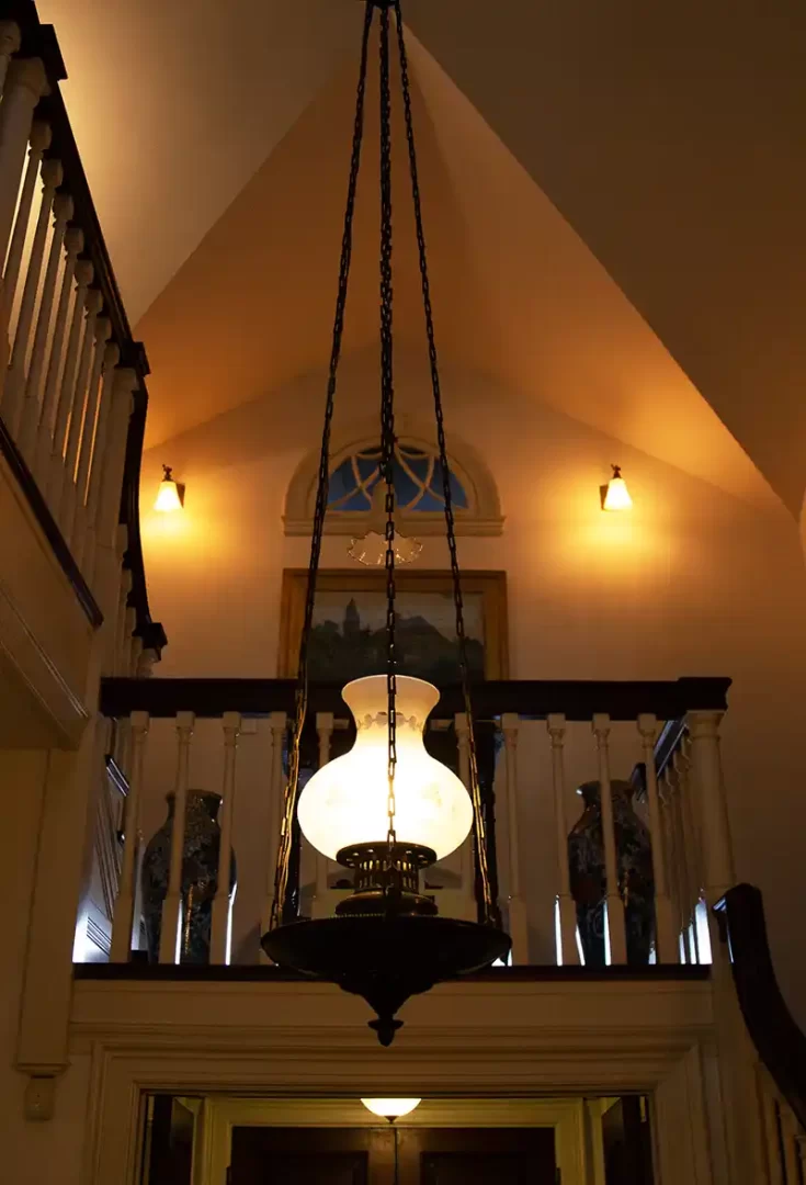 Photo looking up at the stairs from the Athenaeum foyer