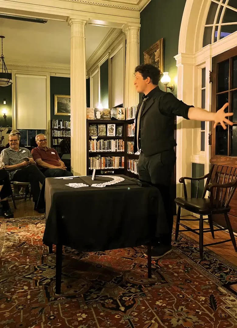 Photo of a magician doing an event at the Athenaeum