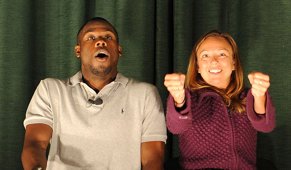 Photo of two improv actors doing a scene